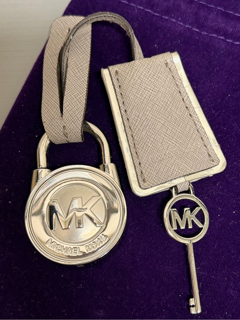 Michael Kors Silver-Tone Padlock Key Charm with Saffiano Taupe Leather